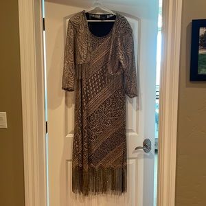 Gold overlay and fringe dress